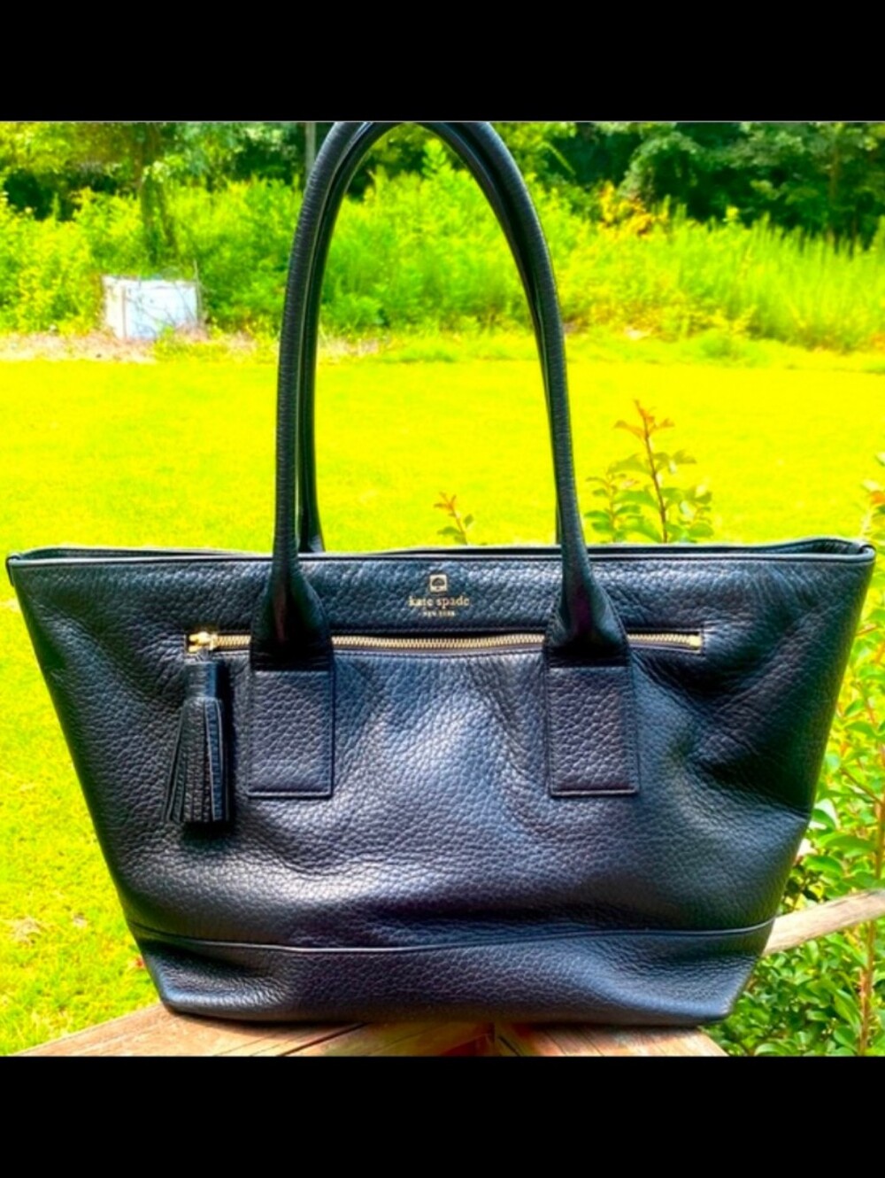 Kate spade Black Pebbled Leather Tote with Tassel Zip Pocket